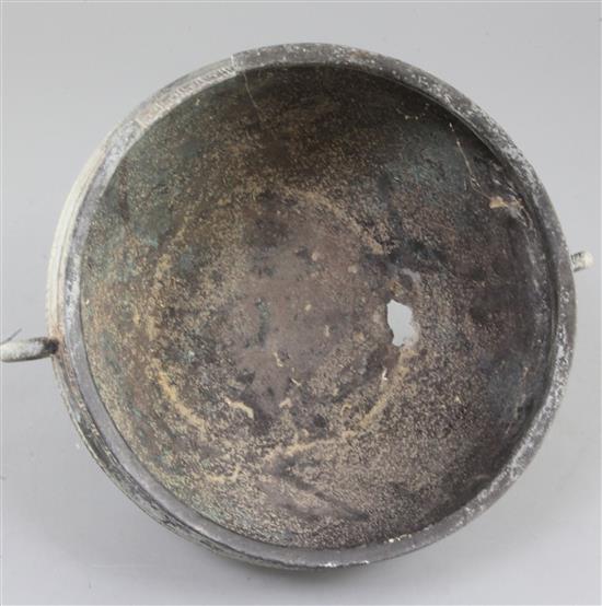 A Chinese archaic bronze flat-bottomed vessel, Eastern Zhou dynasty, 5th-4th century B.C., 31cm wide, losses